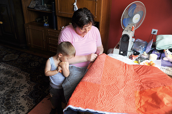 Sabina sewing. Photo by Daniel Lienhard.