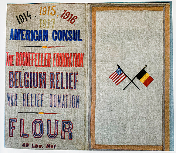 Flour sack embroidered by Belgian women in gratitude for U.S. famine relief aid during WWI.