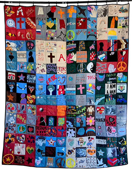 March Quilt, 2015. “This quilt hung in Montgomery and the blocks were arranged in such a way as to imply ‘organization’," explains Lillis Taylor. “The quilt that hung in Selma was more patchwork and the Montgomery quilt has an order to it. We imagined that by the time the marchers got to Montgomery, their disparate selves had solidified into a more organized unit.” Photo by Lillis Taylor