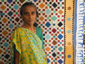 Dahiben Monhanbai Makwna, who has been working professionally in appliqué from the age of 11. She is now a participant in the “Katab: Not Only Money” project. Photo by LOkesh Ghai.