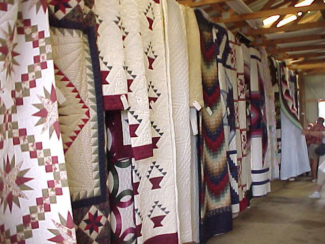 The highlight of the annual Clarita Amish School Auction, Crafts, and Antique Show is when as many as 100 quilts handmade by Amish women go on the auction block.