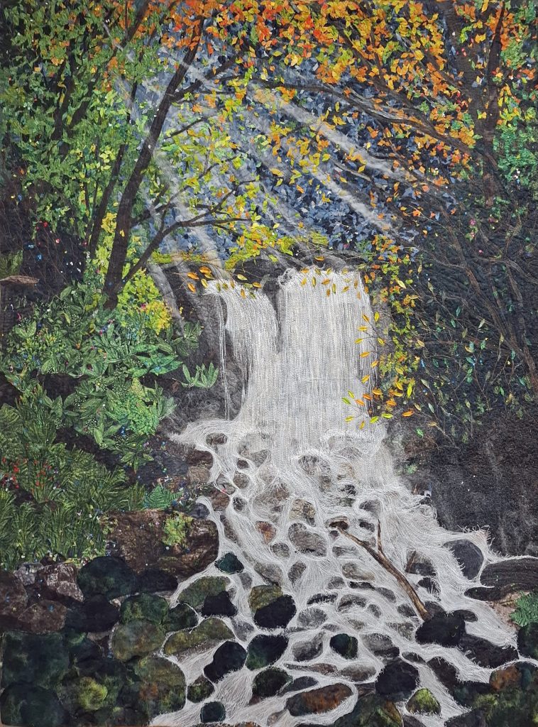 Pictured Quilt: Wulai Waterfall (48” x 63”) by Ami Lee